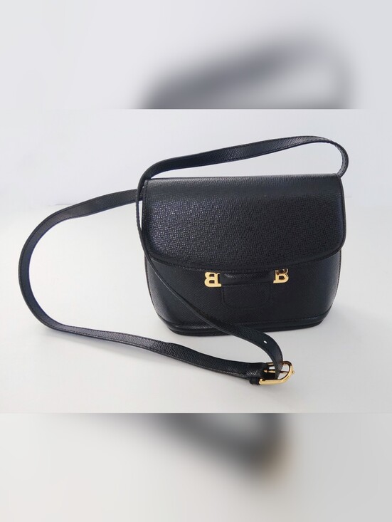 Bally Handbags - Bally Swiss Vintage Black Leather Crossbody with Gold 'B' Hardware. 8×7×3.